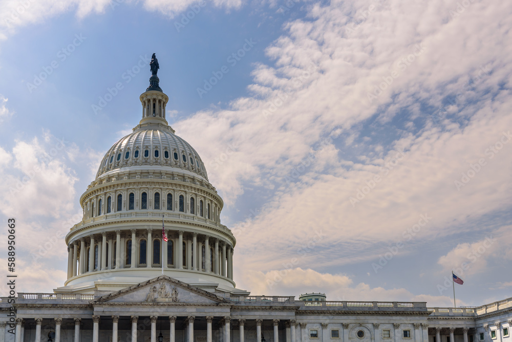 Close up of US Capitol Building dome with cloud sky