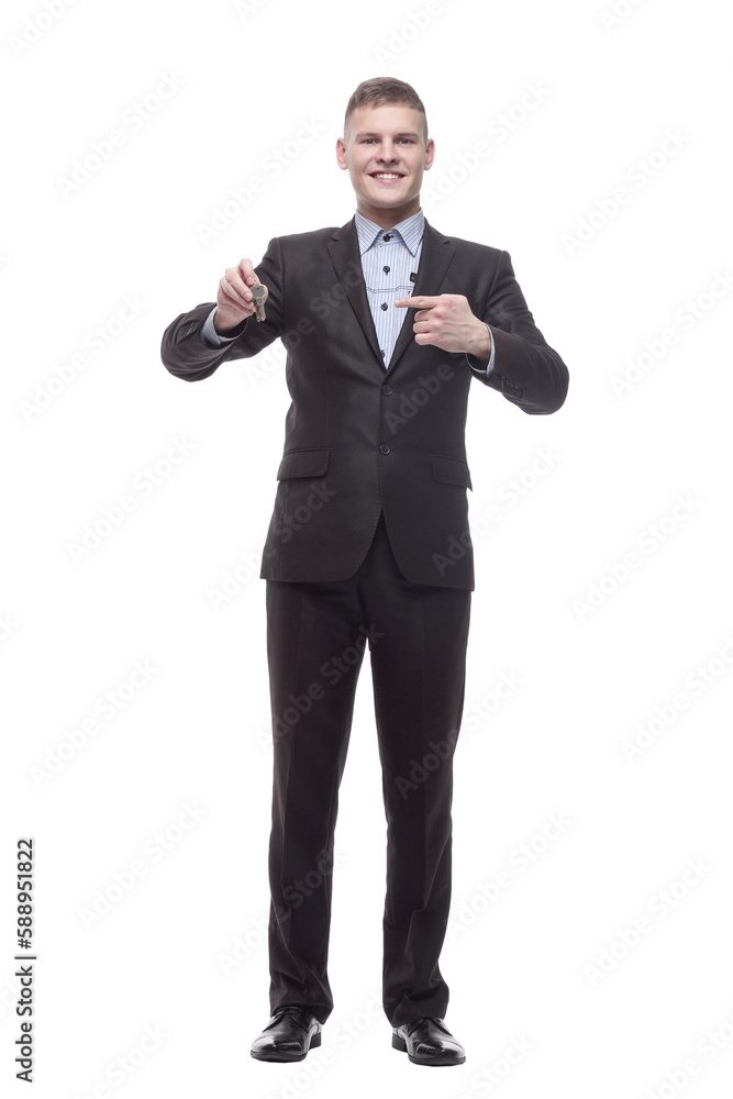 happy young businessman with keys in hand . happy young businessman with keys in hand .