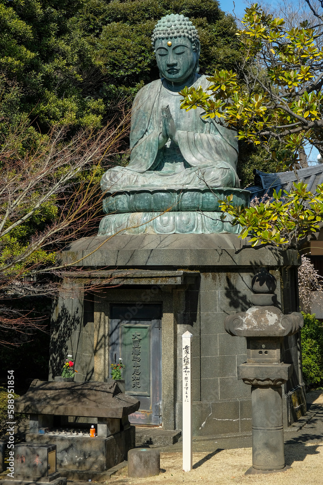 Tokyo, Japan - March 3, 2023: Bronze Buddha statue constructed in 1690 by Ota Kyuemon known as 