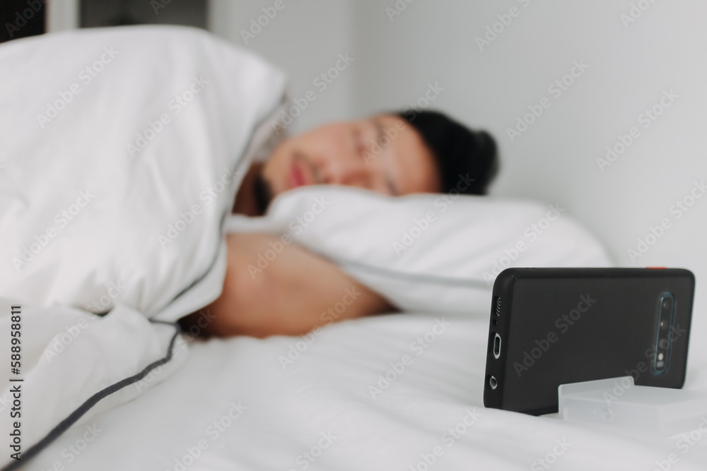 Asian man sleep overnight while on video call with his girlfriend. Distance love. Asian man sleep overnight while on video call with his girlfriend. Distance love.