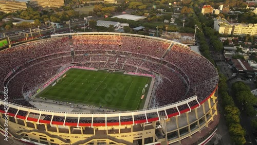 Kick-off during match between River Plate and Arsenal at Monumental Stadium in Buenos Aires, Argentina. Aerial drone view and slow-motion photo