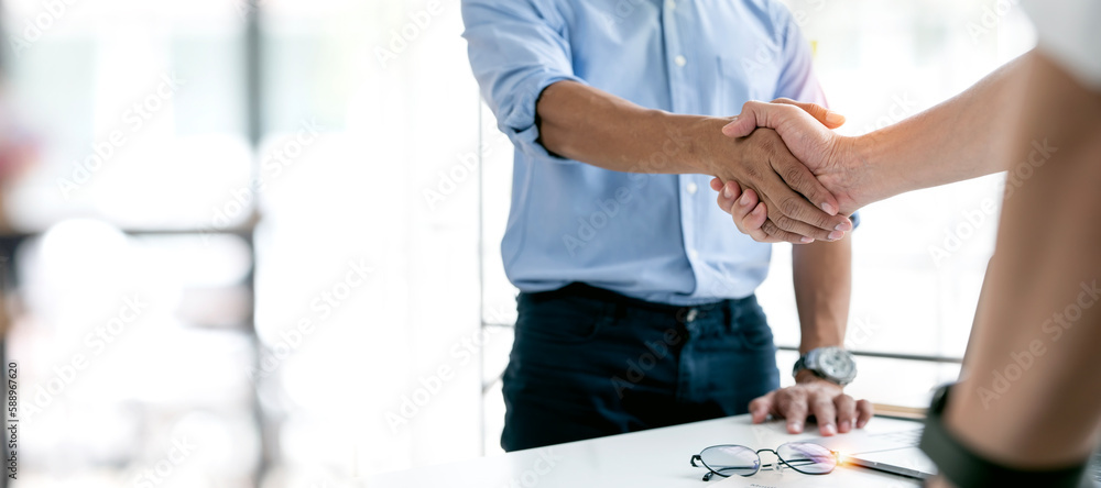 Businessman handshake and business people. Successful business concept.. Businessman handshake and business people. Successful business concept..