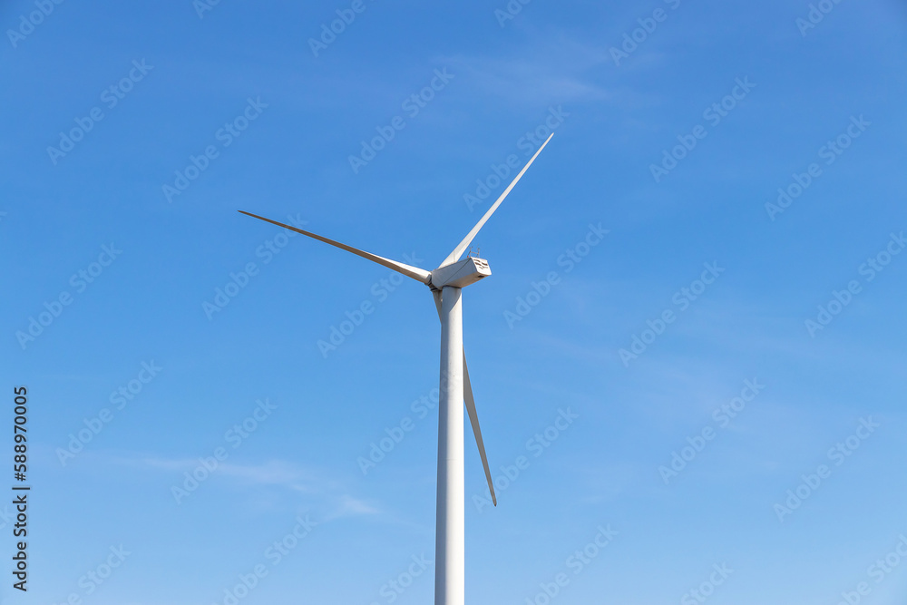 Wind turbines farm on mountanis landscape at Lam Takong Reservoir Views against blue sky with clouds background,Windmills for electric power ecology concept Wind turbines farm on mountanis landscape at Lam Takong Reservoir Views against blue sky with clouds background,Windmills for electric power ecology concept