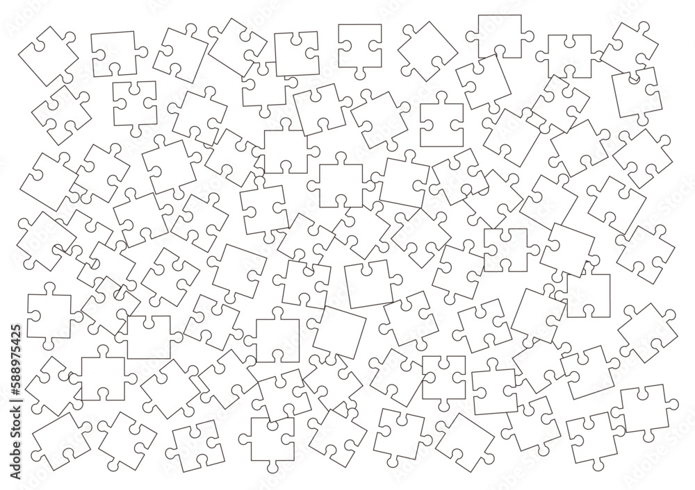 バラバラに散らばった白いジグソーパズル
