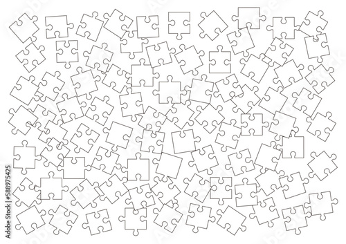 バラバラに散らばった白いジグソーパズル