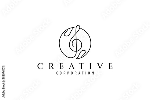 treble clef music logo in circle with leaf variation