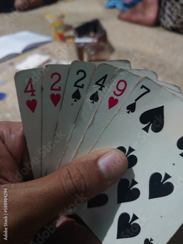 playing cards in the hand