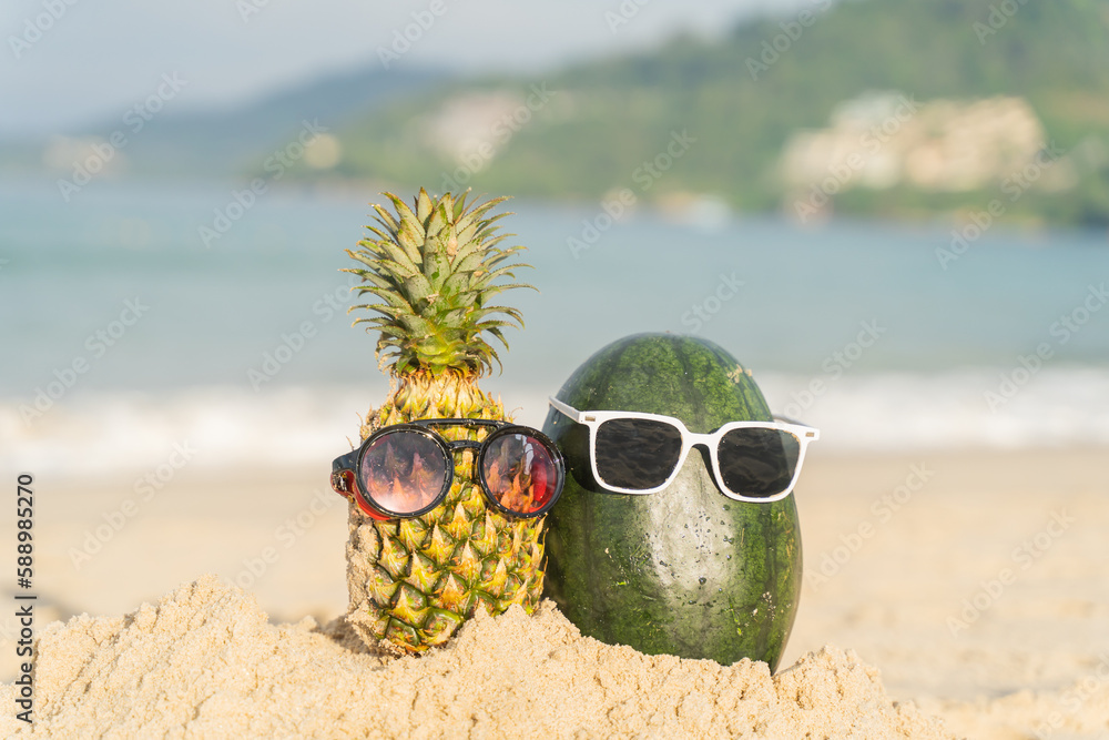 Fruit man made of pineapple and watermelon on the beach fruit tourism for health Funny and cute