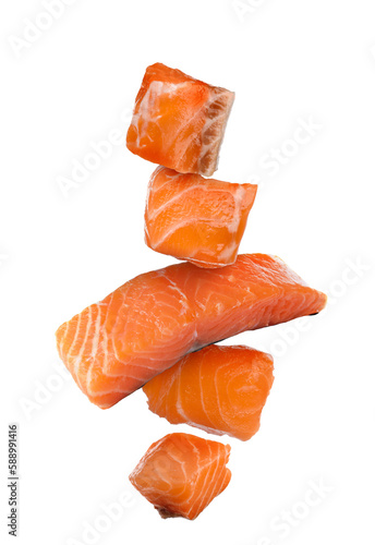 Cut fresh salmon falling on white background