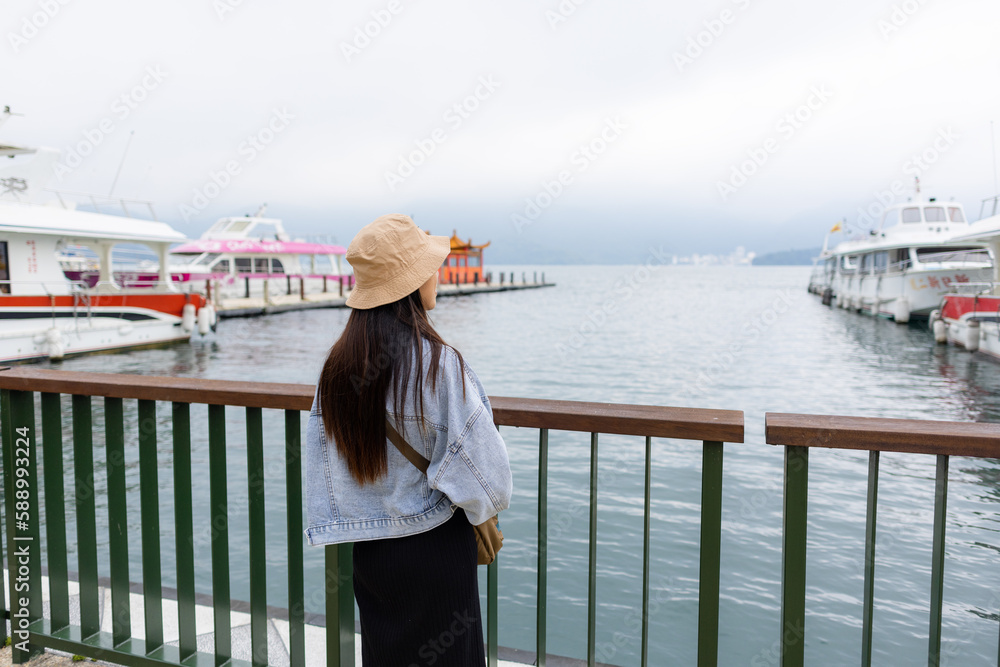 Woman visit sun moon lake in Nantou of Taiwan