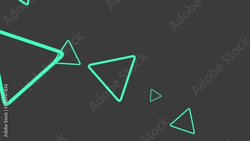 Flying neon green geometric triangles on black gradient, motion simple business and corporate style background photo