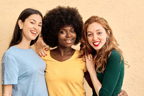 Close up portrait of multiethnic women smiling at camera