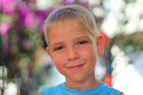 Beautiful smiling little boy portrait blurred background