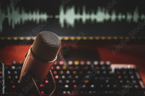 Home studio: microphone and wave form on screen