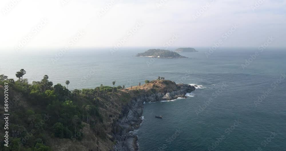 Aerial shot of the andaman sea at yanui beach in phuket thailand on a sunny day. Aerial shot of the andaman sea at yanui beach in phuket thailand on a sunny day.