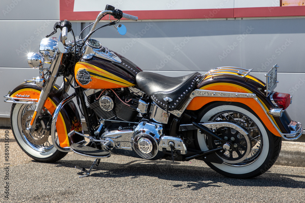 harley davidson heritage softail us logo text and brand sign on yellow