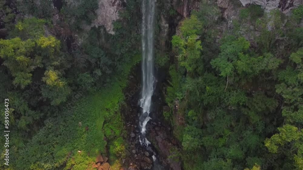 Ascending aerial shot Reveal of Salto Encantado Falls In Misiones, Argentina. Waterfalls In South America with rushing water. Aerial Drone Shot. Ascending aerial shot Reveal of Salto Encantado Falls In Misiones, Argentina. Waterfalls In South America with rushing water. Aerial Drone Shot.