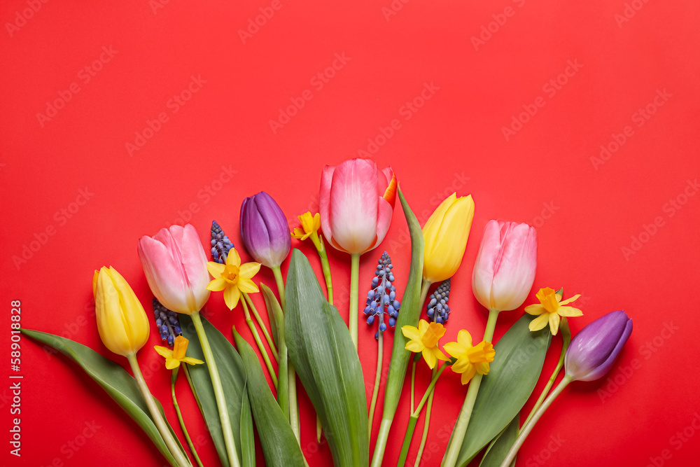 Beautiful different flowers on red background, flat lay Beautiful different flowers on red background, flat lay