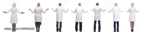 group of doctors standing with their backs isolated