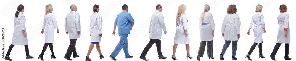 group of doctors in motion isolated on white group of doctors in motion isolated on white