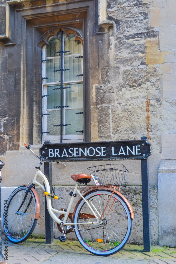 Bicycle parked by the street sign in Oxford Bicycle parked by the street sign in Oxford