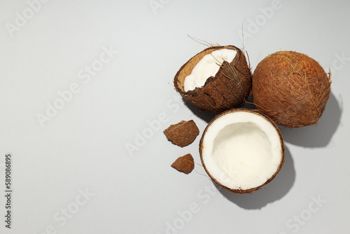 Composition for summer concept with coconut on light gray background