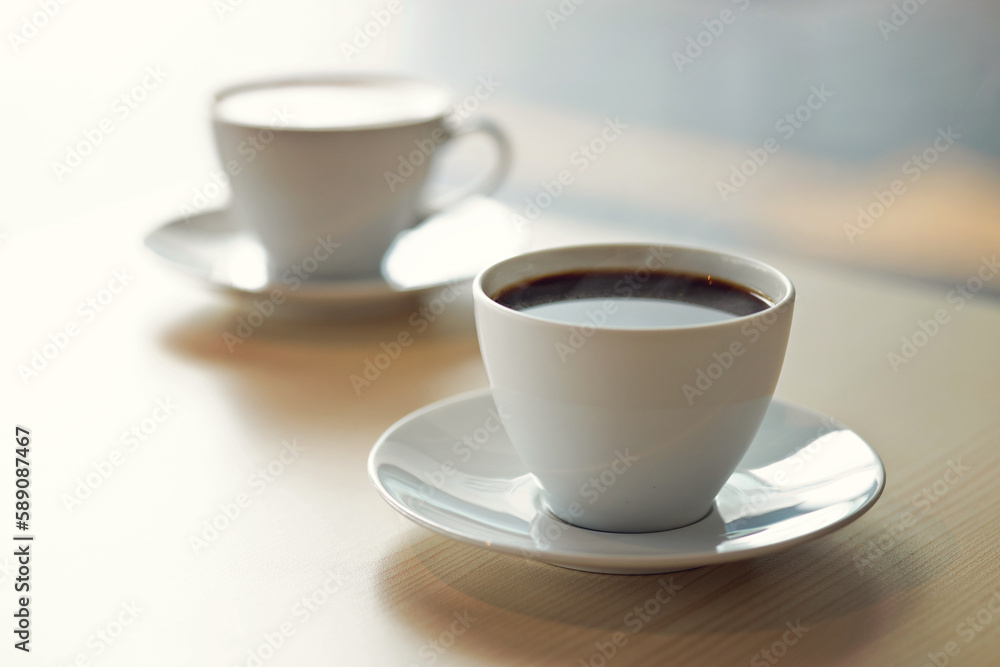 Two cup of coffee on a cafe table