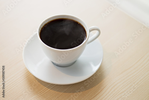 A cup of coffee on cafe table