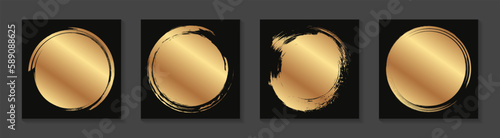 Set of golden grunge paint or ink circles on a black background.