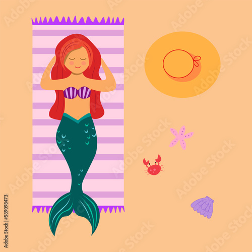 Mermaid sunbathing on the beach