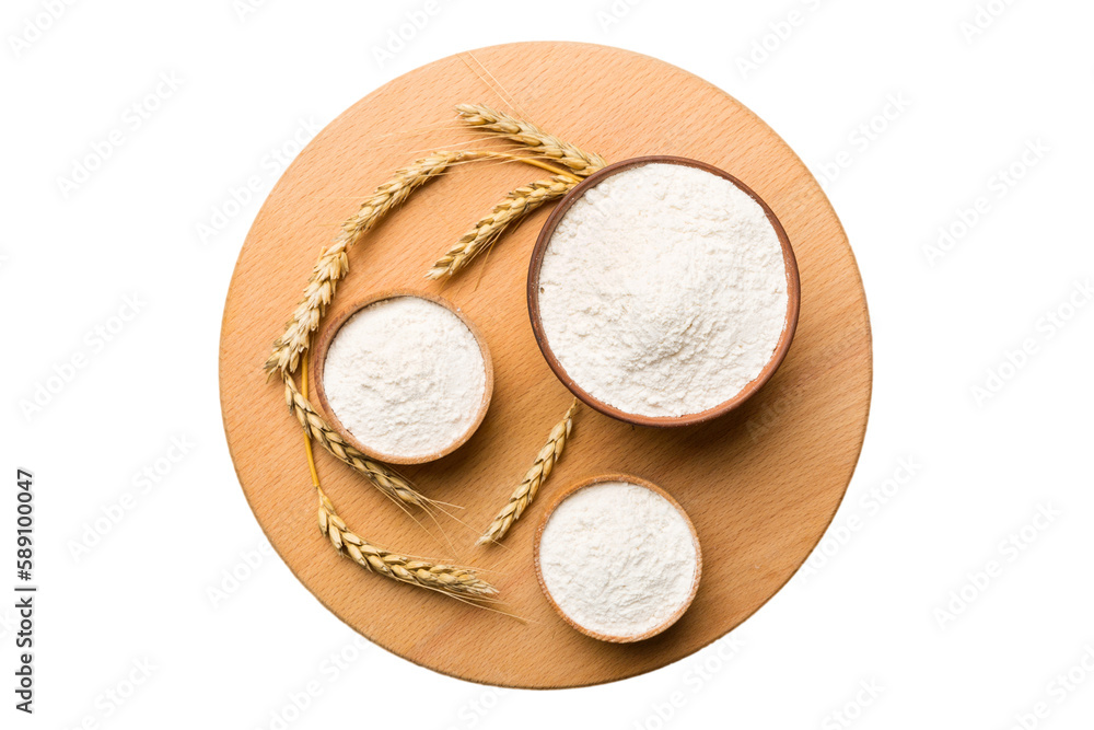 Flat lay of Wheat flour in wooden bowl with wheat spikelets isolated on white background. world wheat crisis Flat lay of Wheat flour in wooden bowl with wheat spikelets isolated on white background. world wheat crisis