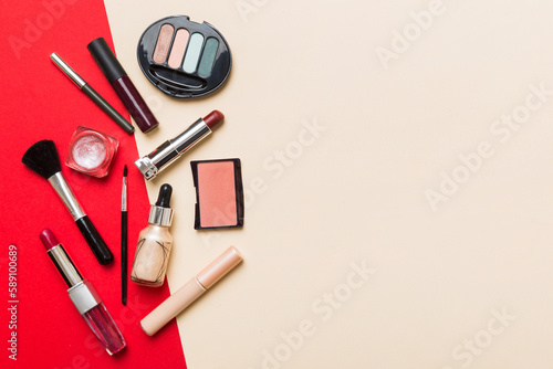 Professional makeup tools. Top view. Flat lay. Beauty, decorative cosmetics. Makeup brushes set and color eyeshadow palette on table background. Minimalistic style