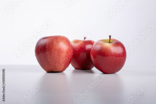 Whole red apples isolated on white background. Created with Generative AI Technology