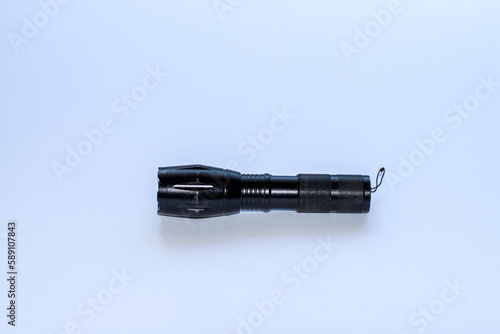Night lighting tool flashlight isolated on white