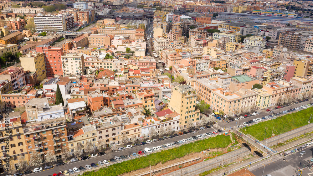 Aerial view of the Pigneto district in Rome, Italy. It is a residential area with many buildings and near the railway tracks.