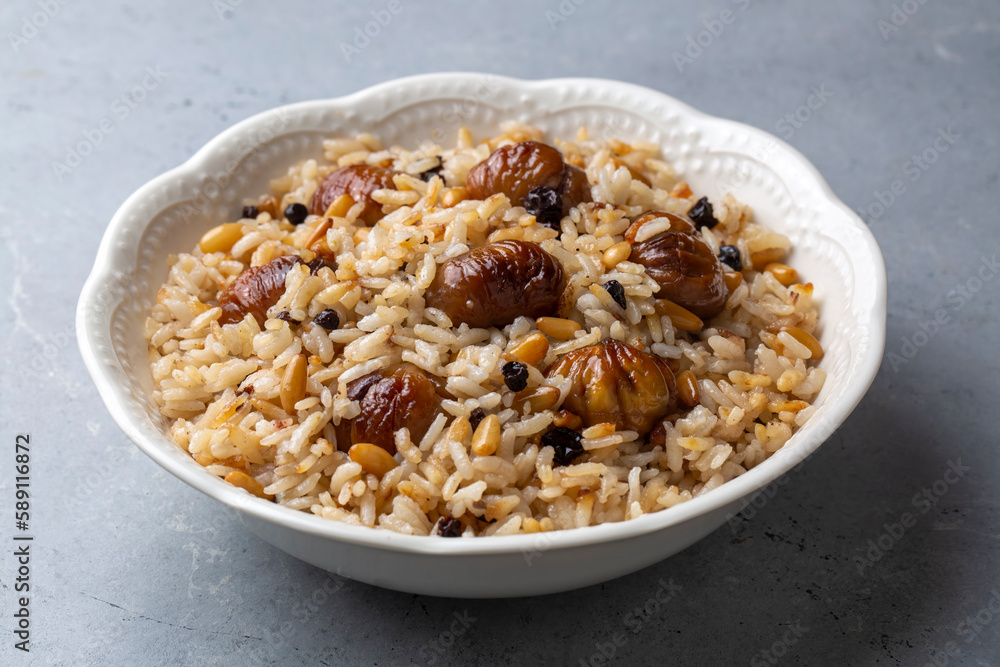 Traditional delicious Turkish food; chestnut rice pilaf (Turkish name; kestaneli pilav) Traditional delicious Turkish food; chestnut rice pilaf (Turkish name; kestaneli pilav)