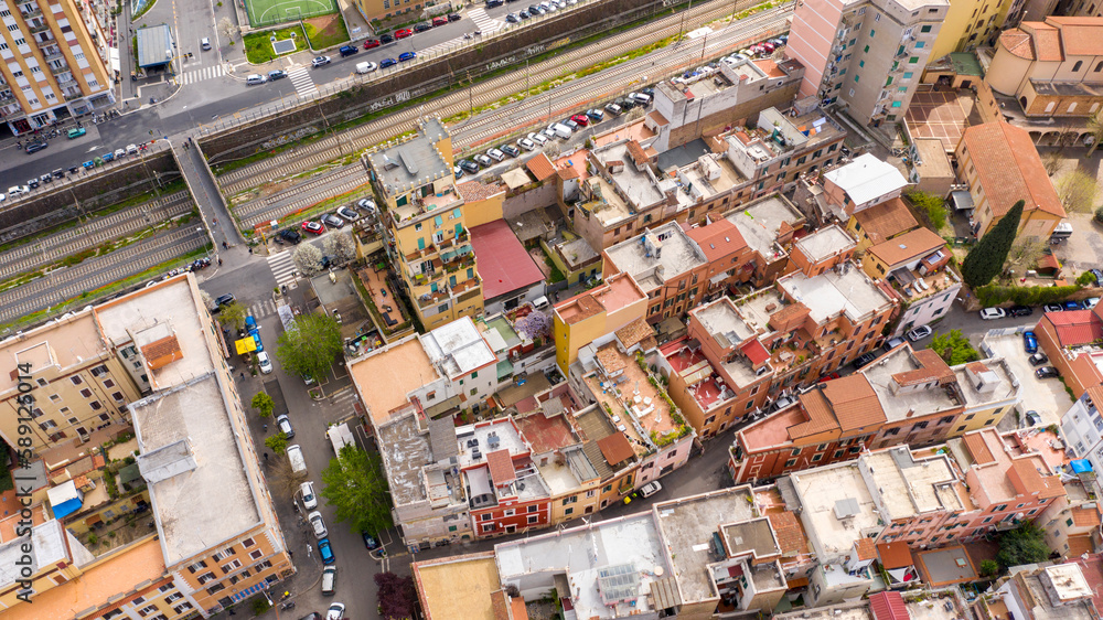 Aerial view of the Pigneto district in Rome, Italy. It is a residential area with many buildings and near the railway tracks.