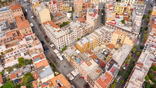 Aerial view of the main street of the Pigneto district in Rome, Italy. It is a pedestrian street in a residential area with many buildings.