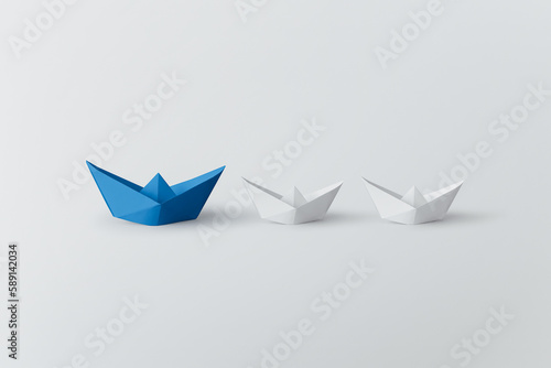 Set of colorful origami ships on white background