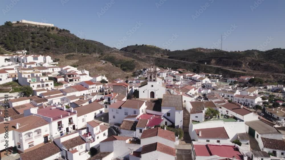 Aerial view orbiting Sanlúcar de Guadiana restored San Marcos hilltop castle and quaint red rooftop village, Spain Aerial view orbiting Sanlúcar de Guadiana restored San Marcos hilltop castle and quaint red rooftop village, Spain