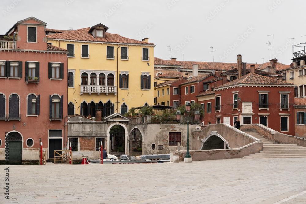 architectural detail of colorful buildings and bridge in Venice, Italy 