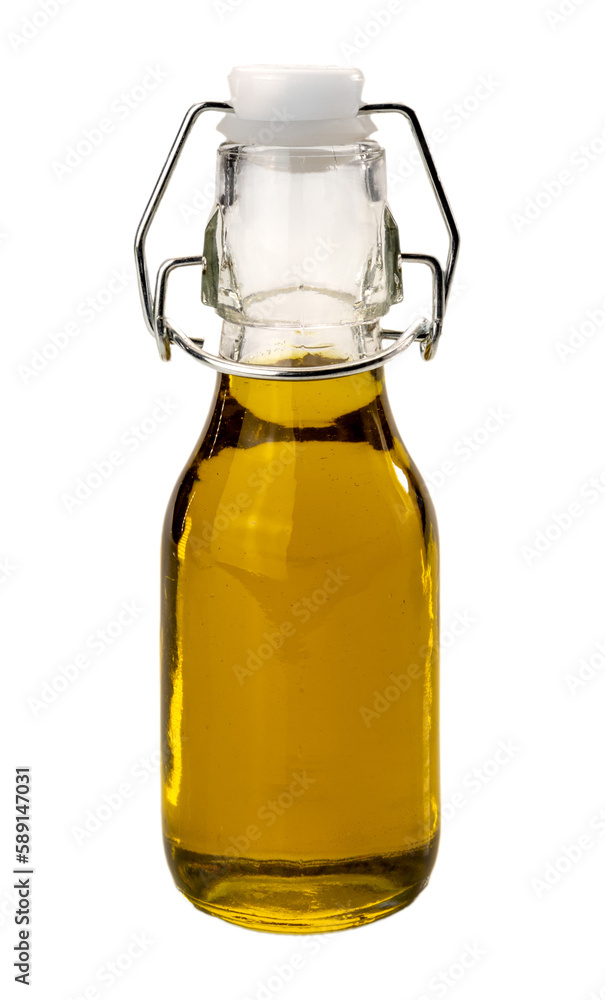 Extra virgin olive oil in small bottle with hermetic mechanical cap, isolated