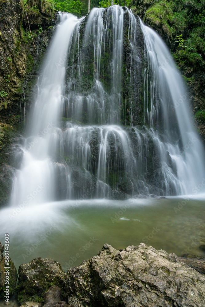 Vertical shot of Josefsthaler Waterfalls. Schliersee, Germany. Vertical shot of Josefsthaler Waterfalls. Schliersee, Germany.