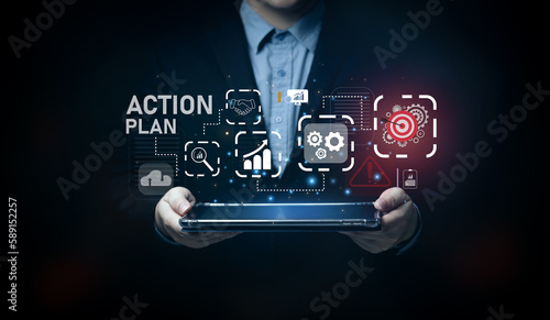 Action plans and project management. Businessman showing business icon processing steps with tablet to plan improvements and set organizational KPIs.