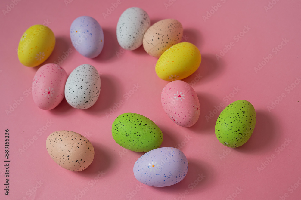Painted quail eggs on a pink background. Easter decorations. Painted quail eggs on a pink background. Easter decorations.