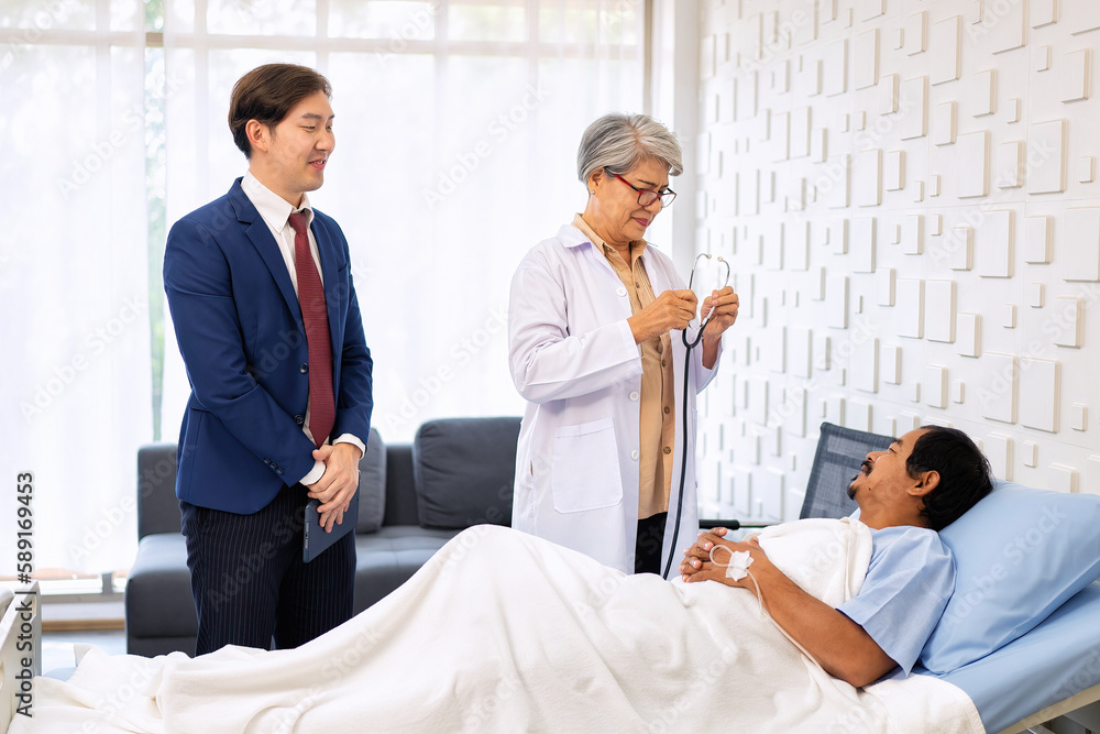 Hospital treatment room relative visit patient lay on bed doctor use stethoscope measurement Hospital treatment room relative visit patient lay on bed doctor use stethoscope measurement