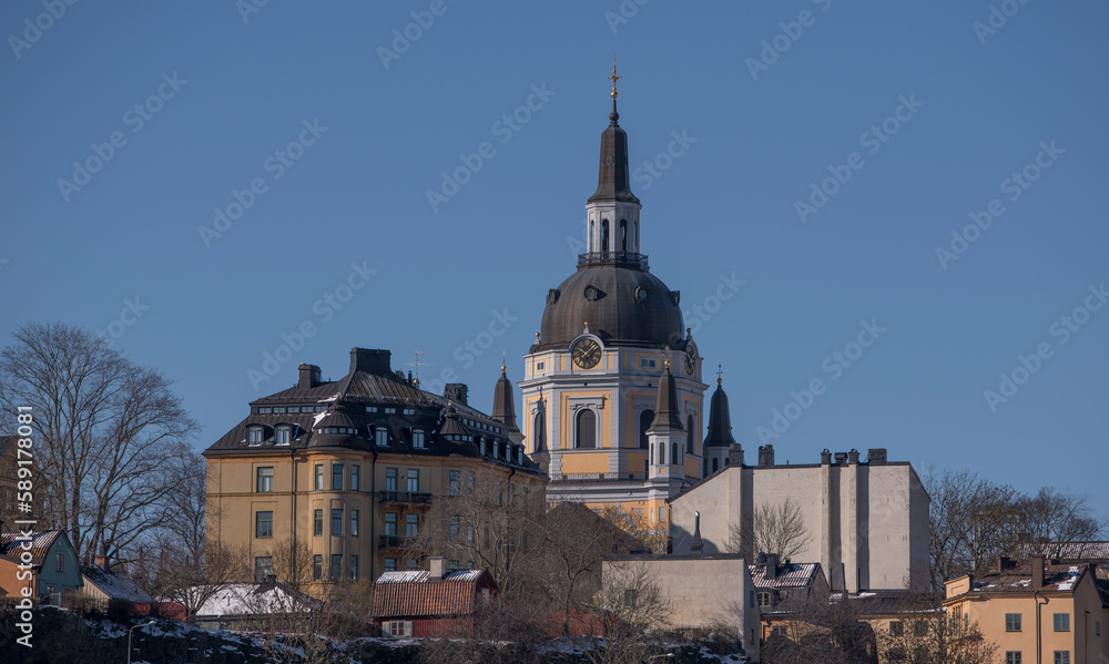 The church Sofia Kyrka on a cliff in the district Södermalm at the bay Strömmen, a sunny spring day in Stockholm