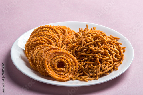 Indian Snack : Besan (Gram flour) Sev and chakli, chakali or Murukku. photo