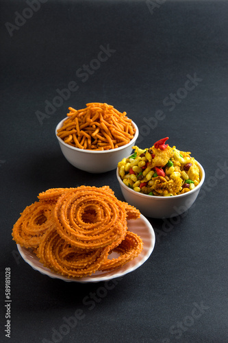 Indian Snack : Chakli, chakali or Murukku and Besan (Gram flour) Sev and chivada or chiwada. Diwali Food