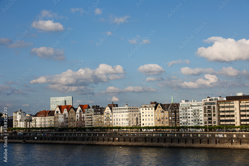 View to the city, river shore and clound in blue sky